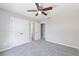 Spacious bedroom with ceiling fan and double closets at 5034 Hickory Hills Dr, Woodstock, GA 30188