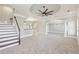 Spacious living room with high ceilings and a ceiling fan at 5034 Hickory Hills Dr, Woodstock, GA 30188