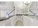 Modern wet bar with dark countertop and shelving at 5034 Hickory Hills Dr, Woodstock, GA 30188