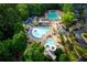 Aerial view of community pool, including lap pool and water slide at 6320 Bannerhorn Run, Alpharetta, GA 30005