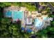 Aerial view of community pool area with multiple pools and water features at 6320 Bannerhorn Run, Alpharetta, GA 30005