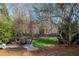 Spacious backyard with fire pit and patio area at 6320 Bannerhorn Run, Alpharetta, GA 30005