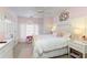 Charming bedroom with white bed and pink accents at 6320 Bannerhorn Run, Alpharetta, GA 30005