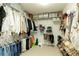 Well-organized walk-in closet with custom shelving at 6320 Bannerhorn Run, Alpharetta, GA 30005