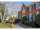 Brick home's front entrance with landscaped walkway at 6320 Bannerhorn Run, Alpharetta, GA 30005