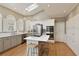 Modern kitchen with stainless steel appliances and white cabinets at 6320 Bannerhorn Run, Alpharetta, GA 30005