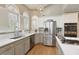 Modern kitchen with stainless steel appliances and white cabinets at 6320 Bannerhorn Run, Alpharetta, GA 30005