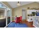 Cozy breakfast nook with a glass door leading to backyard at 1460 Chamblee Gap Rd, Cumming, GA 30040