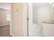 Clean bathroom with granite countertop and marble shower at 2159 Macon Sw Dr, Atlanta, GA 30315