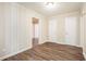 Bright dining room with wood-look floors and built-in storage at 2159 Macon Sw Dr, Atlanta, GA 30315