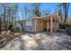 Ranch house exterior with a covered entryway and driveway at 2159 Macon Sw Dr, Atlanta, GA 30315