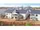 Backyard featuring a screened-in porch and wooden deck in a neighborhood with similar homes at 5860 Collier Bridge Ln, Hoschton, GA 30548
