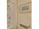 Cozy bathroom featuring a shower tub and vanity with art at 5860 Collier Bridge Ln, Hoschton, GA 30548