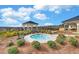 A tranquil spa area with a covered gazebo provides a relaxing oasis, surrounded by landscaped grounds at 5860 Collier Bridge Ln, Hoschton, GA 30548