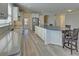 Modern kitchen with spacious island, stainless steel appliances, and stylish countertops at 5860 Collier Bridge Ln, Hoschton, GA 30548