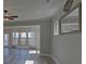 Bright living room with natural light and modern wood-look flooring at 5860 Collier Bridge Ln, Hoschton, GA 30548