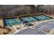 Aerial view of the pickleball courts with the shelter offering a vibrant and active recreational amenity at 5860 Collier Bridge Ln, Hoschton, GA 30548