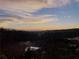 Scenic view of a sunset over the lake, perfect for relaxation and enjoyment at 5860 Collier Bridge Ln, Hoschton, GA 30548