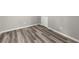 Finished basement with gray walls and wood-look flooring at 1955 E Lake Dr, Marietta, GA 30066