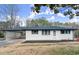 Newly renovated ranch home with carport and landscaped yard at 1955 E Lake Dr, Marietta, GA 30066