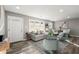Spacious living room with hardwood floors, large windows, and ample seating at 1955 E Lake Dr, Marietta, GA 30066