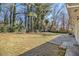 Large backyard with grassy area and patio at 3766 Stanford Cir, Decatur, GA 30034