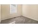 Cozy bedroom with neutral walls and carpet flooring at 3766 Stanford Cir, Decatur, GA 30034