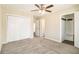 Spacious bedroom with double door closet and ceiling fan at 3766 Stanford Cir, Decatur, GA 30034