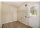 Laundry room with built-in shelving and exterior access at 3766 Stanford Cir, Decatur, GA 30034