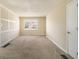 Spacious living room featuring neutral walls and carpet at 3766 Stanford Cir, Decatur, GA 30034