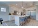 Modern kitchen with stainless steel appliances and white cabinetry at 4423 Eastbrook Pl, Snellville, GA 30039