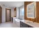 Modern bathroom with double vanity and soaking tub at 1095 Lanier Pl, Cumming, GA 30041