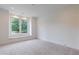 Bedroom with window seat and view, carpeted floor at 1095 Lanier Pl, Cumming, GA 30041