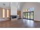 Spacious living room boasts a fireplace and built-in shelving at 1095 Lanier Pl, Cumming, GA 30041