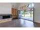 Living room with folding doors opening to backyard at 1095 Lanier Pl, Cumming, GA 30041