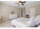 Bright bedroom with a dresser and a comfortable bed at 1240 Woodlawn Ne Dr, Marietta, GA 30068