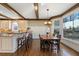 Breakfast nook with wooden table and chairs, overlooking backyard at 1240 Woodlawn Ne Dr, Marietta, GA 30068