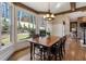 Bright breakfast area with bay window and wooden table at 1240 Woodlawn Ne Dr, Marietta, GA 30068