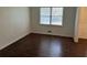 Bright dining room featuring dark brown luxury vinyl plank flooring at 1737 Ramblewood Way, Snellville, GA 30078