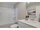 Clean bathroom with a bathtub, vanity, and neutral color scheme at 3311 Cranston Ln, Kennesaw, GA 30144