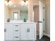 Elegant bathroom boasts a dual sink vanity with sleek hardware and modern lighting at 3311 Cranston Ln, Kennesaw, GA 30144