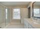 Bathroom features a large shower, double vanity, and marble-look tile flooring at 3311 Cranston Ln, Kennesaw, GA 30144