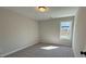 Bright bedroom with carpeted floor and window at 3311 Cranston Ln, Kennesaw, GA 30144