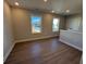 Bright bonus room with wood-look floors and two windows at 3311 Cranston Ln, Kennesaw, GA 30144