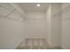 Large walk-in closet with wire shelving for ample storage at 3311 Cranston Ln, Kennesaw, GA 30144