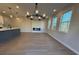 Spacious dining area with chandelier and fireplace at 3311 Cranston Ln, Kennesaw, GA 30144