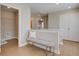 Upstairs hallway with bench, laundry closet, and linen closet at 3311 Cranston Ln, Kennesaw, GA 30144