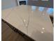 Modern kitchen island with white quartz countertop and dark gray cabinets at 3311 Cranston Ln, Kennesaw, GA 30144