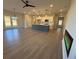 Open concept living area with hardwood floors and fireplace at 3311 Cranston Ln, Kennesaw, GA 30144