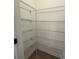 Walk-in pantry with ample shelving for storage at 3311 Cranston Ln, Kennesaw, GA 30144